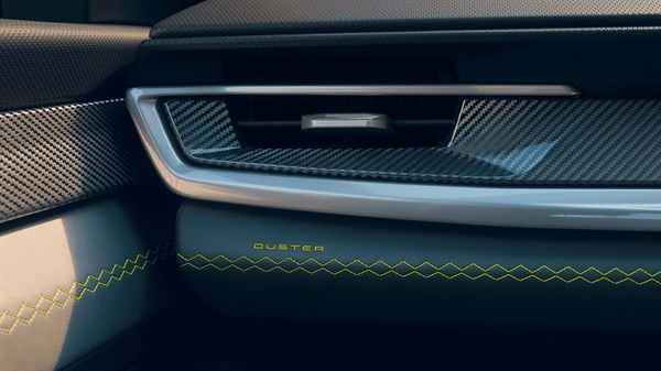 Renault Duster - yellow stitching on the console